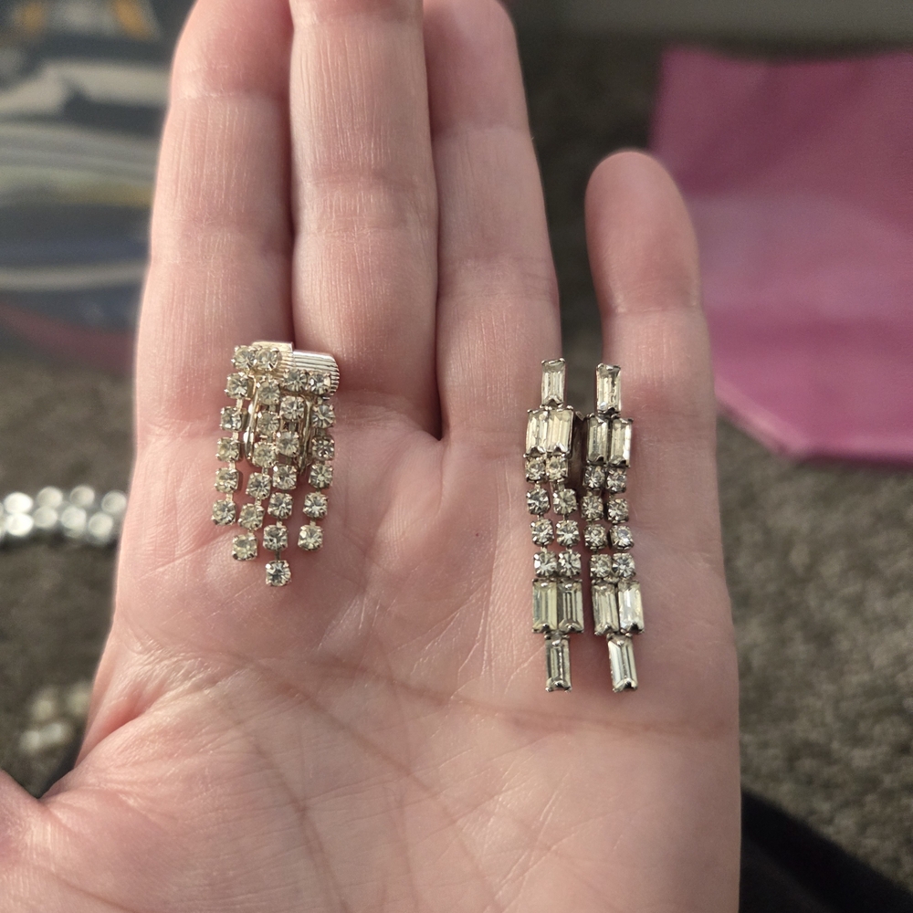 2 Silver tone dangle earrings